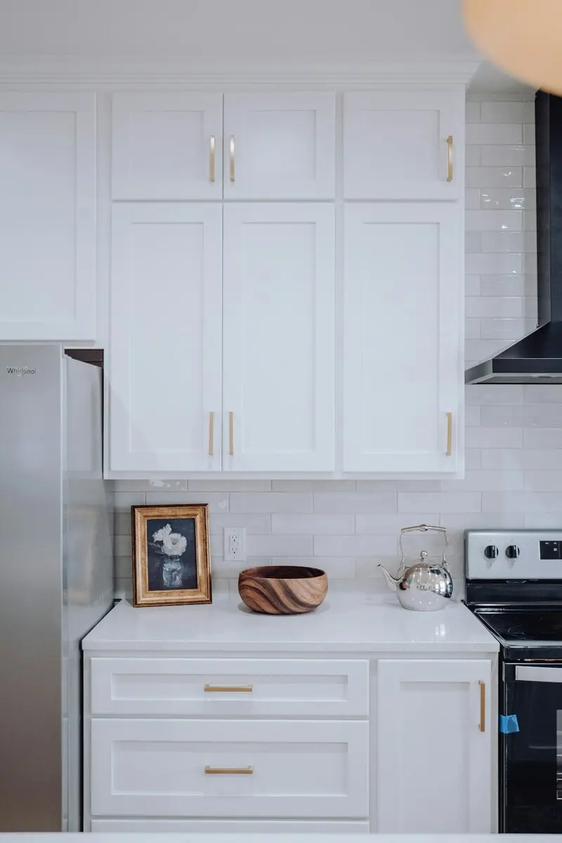 Spotless white kitchen cabinets and counters